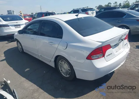 2010 Honda Civic Hybrid from USA, damaged, VIN JHMFA3F29AS005641